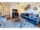 Cozy living room featuring hardwood floors, ample seating, and modern decor at 3501 Beechwood N Ter, Pinellas Park, FL 33781