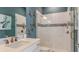 Modern bathroom featuring a glass shower door, stylish fixtures, and sleek design at 3583 Santa Caterina Blvd, Bradenton, FL 34211