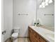 Bright bathroom with dual sinks, ample counter space, and updated fixtures offers a functional and stylish design at 3844 Wellington Pkwy, Palm Harbor, FL 34685