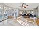 Bright and airy living room with plenty of space, natural light, and stylish decor at 3844 Wellington Pkwy, Palm Harbor, FL 34685
