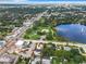 Stunning aerial view of the property near the park, lake, and major roadways at 405 S Lake Dr, Clearwater, FL 33755