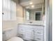 Bathroom featuring single sink vanity and toilet at 405 S Lake Dr, Clearwater, FL 33755