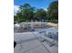 Fun splash pad area with picnic tables and trees for shade at 405 S Lake Dr, Clearwater, FL 33755