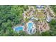 An aerial view highlights the community pools, clubhouse, and recreational areas at 4195 Welling Ter, Land O Lakes, FL 34638