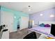 Bedroom with colorful walls and ample closet space at 4195 Welling Ter, Land O Lakes, FL 34638