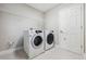 Laundry room featuring a Samsung washer and dryer and overhead shelving at 4195 Welling Ter, Land O Lakes, FL 34638