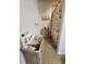 Bathroom with Eiffel tower themed rug and shower curtain at 4210 Pacente Loop, Zephyrhills, FL 33543