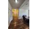 Inviting foyer with a view to the living room at 4210 Pacente Loop, Zephyrhills, FL 33543