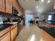 Spacious kitchen with stainless steel appliances and granite countertops at 4210 Pacente Loop, Zephyrhills, FL 33543