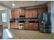 Bright kitchen featuring stainless steel appliances, tile flooring, and plenty of counter space at 4210 Pacente Loop, Zephyrhills, FL 33543