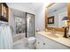 Charming bathroom featuring a vanity and a unique stone-walled shower at 447 22Nd St, Belleair Beach, FL 33786