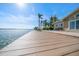 Waterfront deck with lounge chairs for enjoying the sunny view of the water at 447 22Nd St, Belleair Beach, FL 33786