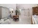 Open foyer featuring tile flooring, high ceilings, and elegant furnishings at 447 22Nd St, Belleair Beach, FL 33786