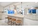 Well-lit kitchen with an island, plenty of cabinets, and views to the water at 447 22Nd St, Belleair Beach, FL 33786