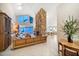 Expansive living room featuring a stone fireplace, vaulted ceilings, and an open layout into the kitchen at 447 22Nd St, Belleair Beach, FL 33786