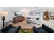 Comfortable living room with stylish furnishings and decor, featuring a woven cabinet and rug at 447 22Nd St, Belleair Beach, FL 33786
