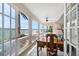 Bright office space with expansive windows, tile floor, and water view at 447 22Nd St, Belleair Beach, FL 33786