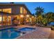 Heated spa flows into a pool and outside dining area at 447 22Nd St, Belleair Beach, FL 33786