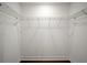 Large walk-in closet with shelving for optimized storage and organization at 4511 S Manhattan Ave # 18, Tampa, FL 33611