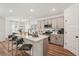 Contemporary kitchen featuring a large island with bar stools and modern appliances at 4754 Easter Ter, North Port, FL 34286