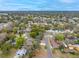 An aerial view of a residential neighborhood featuring single-Gathering homes, mature trees, and well-maintained streets at 6232 Jackson St, New Port Richey, FL 34653