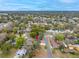 An aerial view of a residential neighborhood featuring single-Gathering homes, mature trees, and well-maintained streets at 6232 Jackson St, New Port Richey, FL 34653