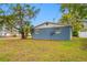 Exterior of single-story home showing a well-maintained yard at 6232 Jackson St, New Port Richey, FL 34653