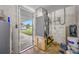 Open utility room with air handler and a view to the backyard at 6232 Jackson St, New Port Richey, FL 34653