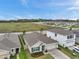 Suburban home with fenced yard backing up to large open field at 7608 Broad Pointe Dr, Zephyrhills, FL 33540