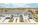 Aerial view of townhomes showcasing well-maintained grounds and convenient garage parking at 7782 93Rd N St, Seminole, FL 33777