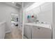 Convenient second-floor laundry room with full-size washer and dryer at 7782 93Rd N St, Seminole, FL 33777