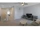 Bonus living room is located on second story and features two closets and ceiling fan at 7782 93Rd N St, Seminole, FL 33777