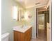 Bathroom featuring modern vanity with hard surface countertop, and updated lighting and plumbing fixtures at 800 71St N Ave # 8, St Petersburg, FL 33702