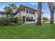 Well maintained condo with large windows, green lawn, and ample natural light at 800 71St N Ave # 8, St Petersburg, FL 33702