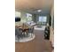 Bright living room featuring stylish decor, modern furniture, and plenty of natural light with dining room attached at 860 Glen More Ct # B, Palm Harbor, FL 34684
