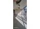 Sunlit Florida room with floor-to-ceiling windows, carpet flooring, and fan lighting at 90 S Highland Ave # 224, Tarpon Springs, FL 34689