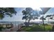 Picturesque waterfront view from the dock featuring a tranquil lake and beautiful scenery at 90 S Highland Ave # 224, Tarpon Springs, FL 34689