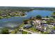 Breathtaking aerial view of lakefront properties showcasing stunning lakeside living and lush surroundings at 903 Setter Ct, Seffner, FL 33584