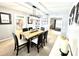 Comfortable dining room featuring a wooden table and view into the kitchen area at 903 Setter Ct, Seffner, FL 33584