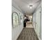 Welcoming entryway with a view into the living room and featuring a geometric rug at 903 Setter Ct, Seffner, FL 33584
