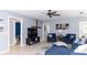 Comfortable living room with plenty of natural light, ceiling fan, and stylish decor at 903 Setter Ct, Seffner, FL 33584