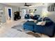 Comfortable living room with plenty of natural light, ceiling fan, and stylish decor at 903 Setter Ct, Seffner, FL 33584
