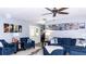 Comfortable living room with plenty of natural light, ceiling fan, and stylish decor at 903 Setter Ct, Seffner, FL 33584