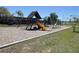 Community playground featuring swings, slides, and play structures in a well-maintained recreational area at 903 Setter Ct, Seffner, FL 33584