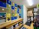 Organized storage room featuring cubbies, a workbench, and storage solutions at 903 Setter Ct, Seffner, FL 33584