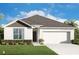 Charming one-story home showcasing a well-manicured lawn and a two-car garage, blending comfort and curb appeal at 4754 Easter Ter, North Port, FL 34286