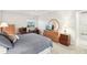 Bedroom with a workspace area featuring carpet flooring, a ceiling fan, and neutral colored walls at 1015 Harefield Cir, Sun City Center, FL 33573