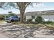 Inviting single-story home with well-maintained lawn and greenery, set in a peaceful neighborhood at 1015 Harefield Cir, Sun City Center, FL 33573