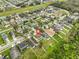Aerial view highlighting neighborhood homes with green lawns and surrounding community at 10730 Shady Preserve Dr, Riverview, FL 33579