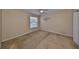 Bright bedroom with a ceiling fan, neutral walls, carpet flooring and a window view at 10730 Shady Preserve Dr, Riverview, FL 33579